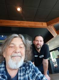 Sign spinner at 117th and 4th Plain