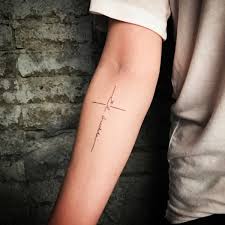 The cross design is as timeless as the sea. 70 Best Cross Tattoos For Men And Women