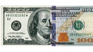 Dollar scheine in einer hand. Fed Bringt Neuen 100 Dollar Schein In Umlauf Der Spiegel