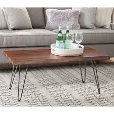 The leg's clean lines and angles perfectly complement the rich, natural elm. Https Images Costco Static Com Imagedelivery Imageservice Profileid 12026540 Imageid 1167433 847 Coffee Table Live Edge Coffee Table Coffee Table Inspiration