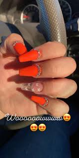 The two products (known as a monomer and a polymer, respectively) together form a soft ball that can be fashioned into a nail shape. Orange Nails Orange Acrylic Nails Nails Design With Rhinestones Orange Nails