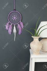 New home interior design cool modern bedroom decor. Lilac Dream Catcher And White Bedside Table In Bedroom Interior Stock Photo Picture And Royalty Free Image Image 87628491