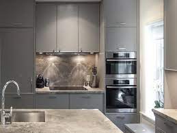 Our kitchen designers can help! Gray Flat Front Kitchen Cabinets Contemporary Kitchen Contemporary Kitchen Contemporary Grey Kitchen Kitchen Cabinet Styles