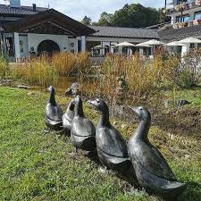 Entenmarsch Vor Dem Alpenhof Murnau Outdoor Decor Outdoor Garden Sculpture
