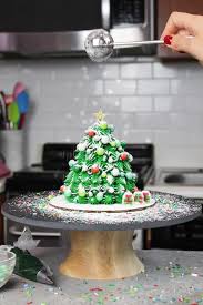 Ermmm…did someones dog ruin a perfectly white frosty creation? Mini Christmas Tree Cakes The Perfect Little Holiday Dessert