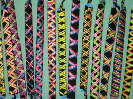 Making combination friendship bracelets of leather and threads for women. Omfg Friendship Bracelets