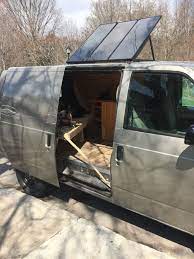 Completed bed in diy astro van conversion. 2002 Gmc Safari Camper Van Conversion Van Life Van Ideas My Solar Set Up Van Life Gmc Safari Van Camping