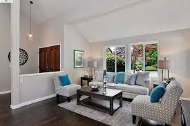A light grey sofa would go well with a dark grey carpet, adding contrast and a minimalist style, while a charcoal grey sofa goes nicely with light grey flooring (again for the same reasons). 39 Beautiful Living Rooms With Hardwood Floors Designing Idea