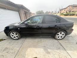 Image result for Sparkling Black 2007 Mazda3
