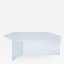 It comes with an oval top that rests upon a metal base, with acrylic legs that definitely stand out the moment you walk into the room. Sebastian Scherer Satin Glass Isom Oblong Coffee Table Sebastian Scherer