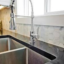 The numerous types of backsplash tile include subway tiles, glass tiles, metal tiles, porcelain tiles and stone tiles, among others. Marble Hex Tile Backsplash Design Ideas