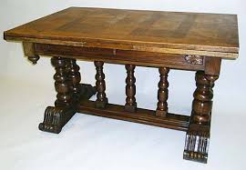 Antique style french oak veneered top rectangular dining table with a cerused carmel finish raised on a solid cocoa finish base with turned legs and pedestal bases joined by a stretc. French Small Draw Leaf Dining Table 4112 By M Markley Antiques