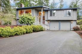 Screened porches make up the rear of the house, but one can see the covered side porch at left (with master bath shower above) and the new back deck at the right. The 5 Most Important Exterior Features Of A Mid Century Modern Home
