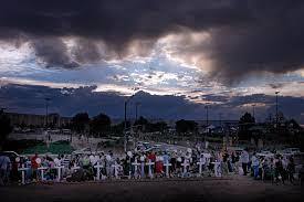 Storm Clouds Gather Above A Memorial For The Victims In The Shooting Across The Street From The Century 16 Movie Theate Powerful Images Powerful Pictures Photo