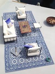 klantfoto van plastic vloerkleed op het terras tapijt tuin buiten tapijt vloerkleed buiten