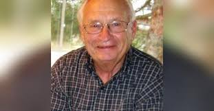 JAMES J. KRENEK Obituary