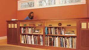 Find out how they did it, and be sure to check out their post on how they made the bookshelves themselves near the bottom of the post. Add Storage To Your Stair Rail Fine Homebuilding