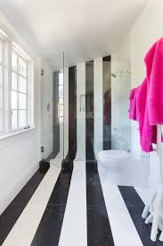 Black And White Marble Floor Bathroom Contemporary Kid S Bathroom Features Black And White Marble Stripe Floors Which Seamlessly Continues To Black And White Marble White Marble Floor Striped Tile
