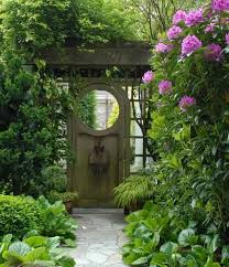 Hours may change under current circumstances Garden Gate With Circle Cutout Door Garden Gate Design Garden Gates Garden Doors