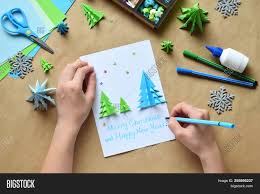 Greenlight doesn't have any minimum or maximum age requirements, but it's intended to help kids learn to save, spend, earn, give and even invest. Making Greeting Card With Origami 3d Xmas Tree From Paper Merry Christmas And Happy New Year Decora Image Stock Photo 255895237
