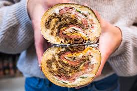 This steak bomb sandwich recipe combines tender shaved steak, melted provolone cheese, caramelized onions, mushrooms sautéed in bourbon, and our roasted garlic aioli into one amazingly good steak bomb sandwich. Topol Sandwich Blogto Toronto