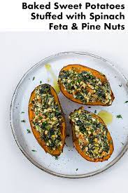 Baked Sweet Potatoes Stuffed With Spinach Feta Cheese And Pine Nuts Sweet Paul Magazine Sweet Potato Dishes Sweet Potato Spinach Recipes