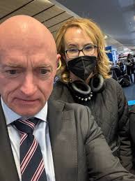 Captain Mark Kelly: "Valentine's Day surprise last night. Look who I ran  into at the gate in Dallas