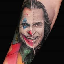 9.smiling joker with camera tattoo designs for arm. Bekommt Joker Den Oscar Fur Die Meisten Tattoos Tattoo Spirit