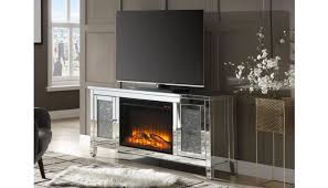 The fireplace tv stand combo allows you and your guests to enjoy a large space to hold your plasma tv and any additional accessories while allowing the top rated electric fire to warm the room. Laylah Mirrored Tv Stand Fireplace