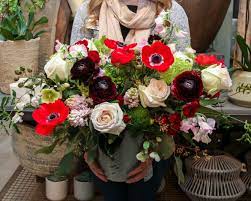 Red Anemones White Garden Roses And Burgundy Ranunculus Blossoms Floral Design By Winston Flowers Flower Delivery Winston Flowers Same Day Flower Delivery