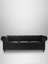 Across numerous designs, the woven tufts pair beautifully with the intimate curves of our sofa's arms. Black Velvet Chesterfield Sofa West Coast Event Productions Inc