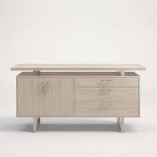 Steel file cabinets on casters are sleek and contemporary, working well in small spaces where they can easily be rolled out of the way. Clybourn Pickled Oak Credenza Crate And Barrel