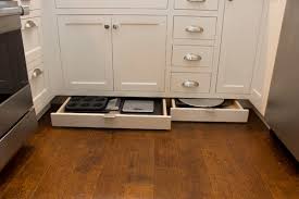 Without toe kick the user would need to bend forward. Why We Love Toe Kick Drawers Storage Trends In The Kitchen