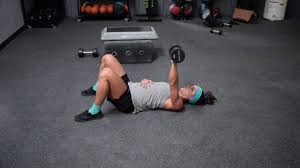 Single Arm Dumbbell Floor Press Strength Coach Annie Miller Shows You The Correct Way To Perform This Exerc Injury Prevention Improve Movement Chest Workouts