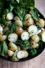 Potatoes prepared for humans are often accompanied by onions or garlic, both of which should never be eaten by a cat. English Mint Potato Salad From The Larder