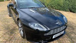 Image result for Onyx Black 2012 Aston Martin