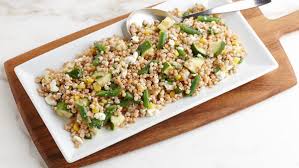 De schil van de paprika wordt in de oven zachter en zoeter. Couscous Salad With Tomatoes And Hot Green Peppers Recipe Finecooking