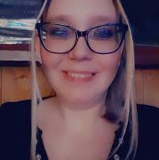 Who owns the car behind the barbershop next to Whites?