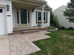 A Porch Overlay With Paver Brick And A New Sidewalk Transformed The Front Entrance To This Home It I Brick Porch Brick Paver Patio Small Front Porches Designs