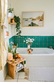 The wood flooring in a raw finish, some indoor plants, and round decorative jute rug complement the wallpaper to bring the boho style to the room. Boho Chic Bathroom Decor Novocom Top