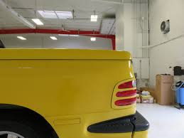 Image result for Federal Safety Yellow 2002 Truck