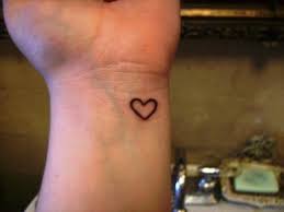 Hands holding heart | hands holding an anatomical heart tattoo by. 60 Sweet Heart Tattoos For Wrist