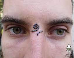 Pin By Britt De Bruyn On Face Piercings In 2021 Third Eye Piercing Eye Piercing Cool Piercings