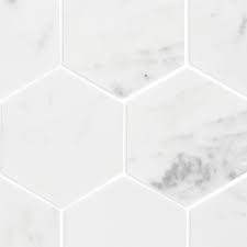 I've fallen in love with marble hexagon tiles for our bathroom renovation. Carrara Marble Large Hexagon Mosaic Tiles 305x285