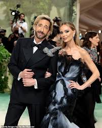 Adrien Brody debuts new blonde hair as he and glamorous girlfriend Georgina  Chapman arrive to star-studded 2024 Met Gala