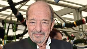 Nach seiner Herz-OP: Ralph Siegel im Rollstuhl bei Event