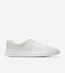 These versatile cole haan shoes combine the ease of sneakers with the polish of classic derbies, and feature the brand's comfortable grandpro insole. Men S Grandpro Rally Laser Cut Sneaker In White Cole Haan