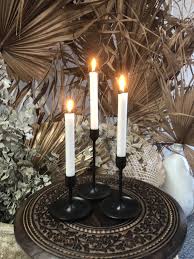 Delight your guests and make any occasion extra special by adding a lighted or flameless candle to this candle holder centerpiece. Black 3 Piece Candlestick Holders The Wedding Event Creators