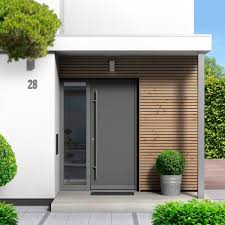 If you are looking for a simple design for your front entrance then adding two customized stone walls on either side of your door can be a great idea. 10 Modern Front Doors We Are Loving Right Now Modern Entrance Door Modern Exterior Doors Modern Front Door
