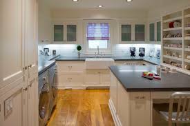This multipurpose room functions as a laundry area and craft space. Laundry Craft Room Houzz